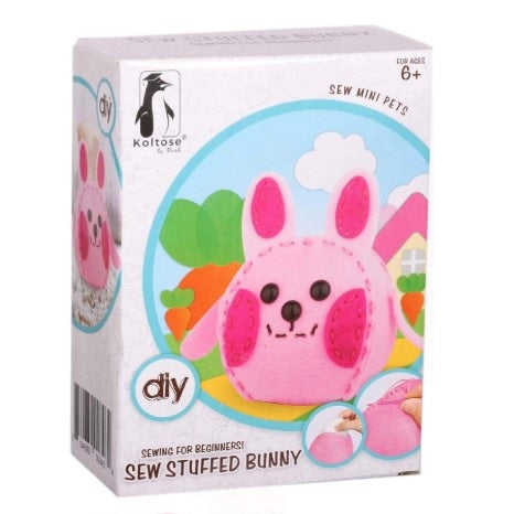 Close up of a "Koltose" brand sewing kit box, featuring a pink felt bunny and the words "Sew Stuffed Bunny" on a white background.